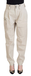 Pantalon beige à taille haute pour femmes de Dolce & Gabbana, coupe élégante et tissu fluide.