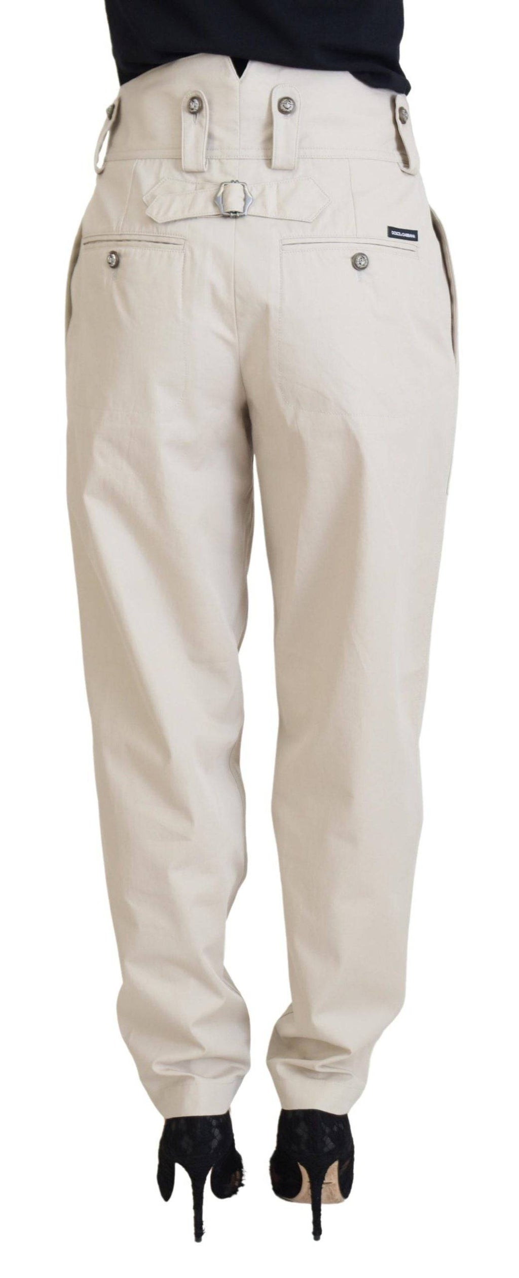 Pantalon beige à taille haute pour femmes de la marque Dolce & Gabbana, coupe élégante et tissu fluide visible dans l'image.