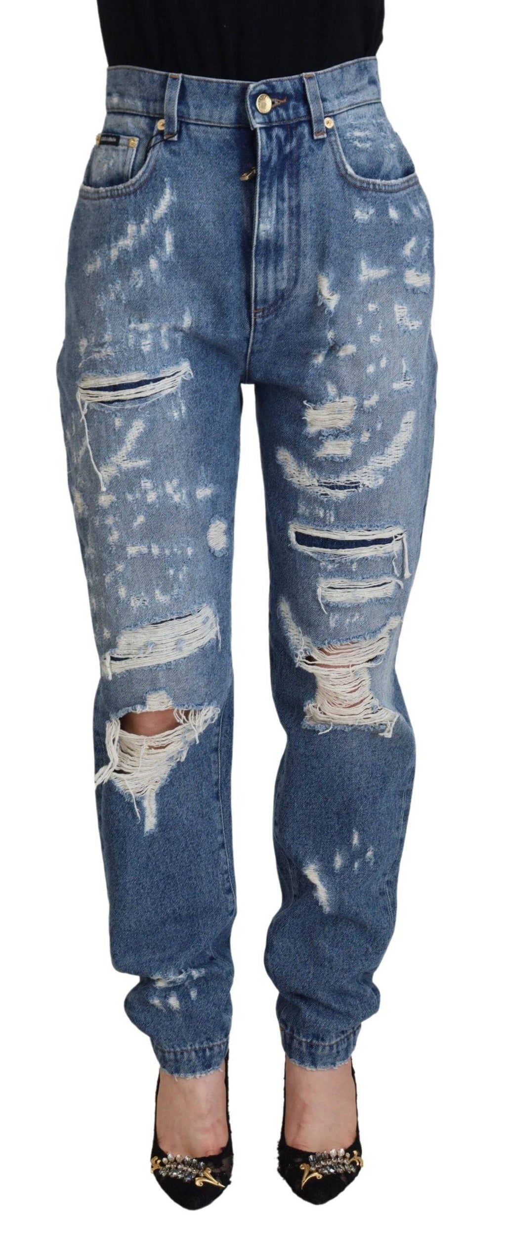 Jeans en denim déchiré en coton lavé bleu de Dolce & Gabbana, style décontracté et tendance.