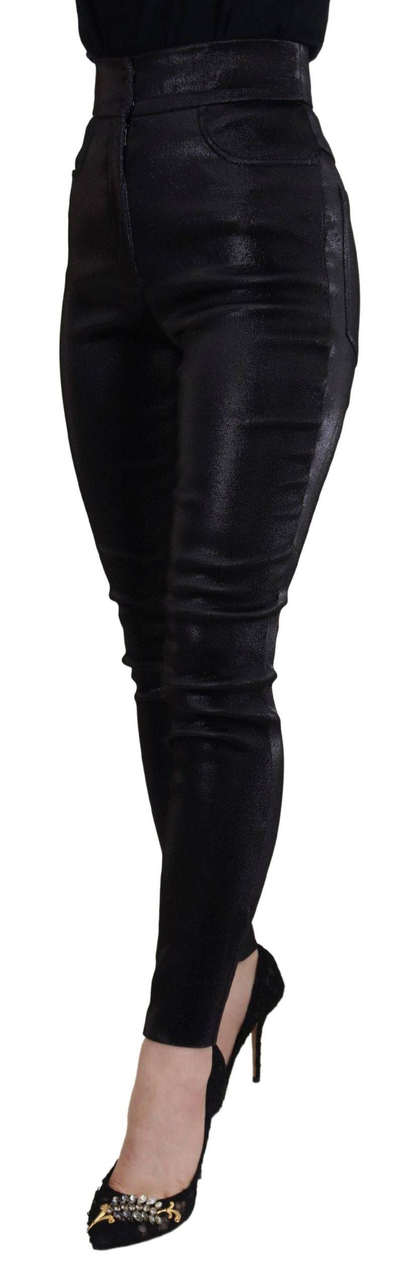 Jeans skinny en denim noir en coton lavé de Dolce & Gabbana, ajustés avec détails modernes, vue de face.