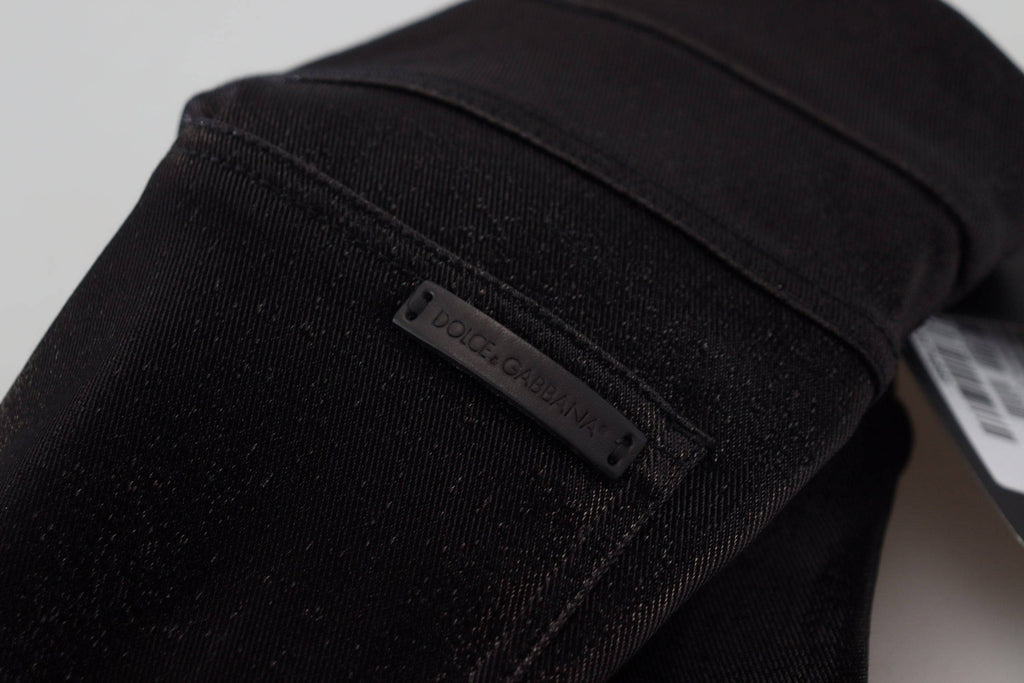 Jeans skinny en coton lavé noir de Dolce & Gabbana, coupe ajustée, détails modernes, vue de devant sur fond neutre.