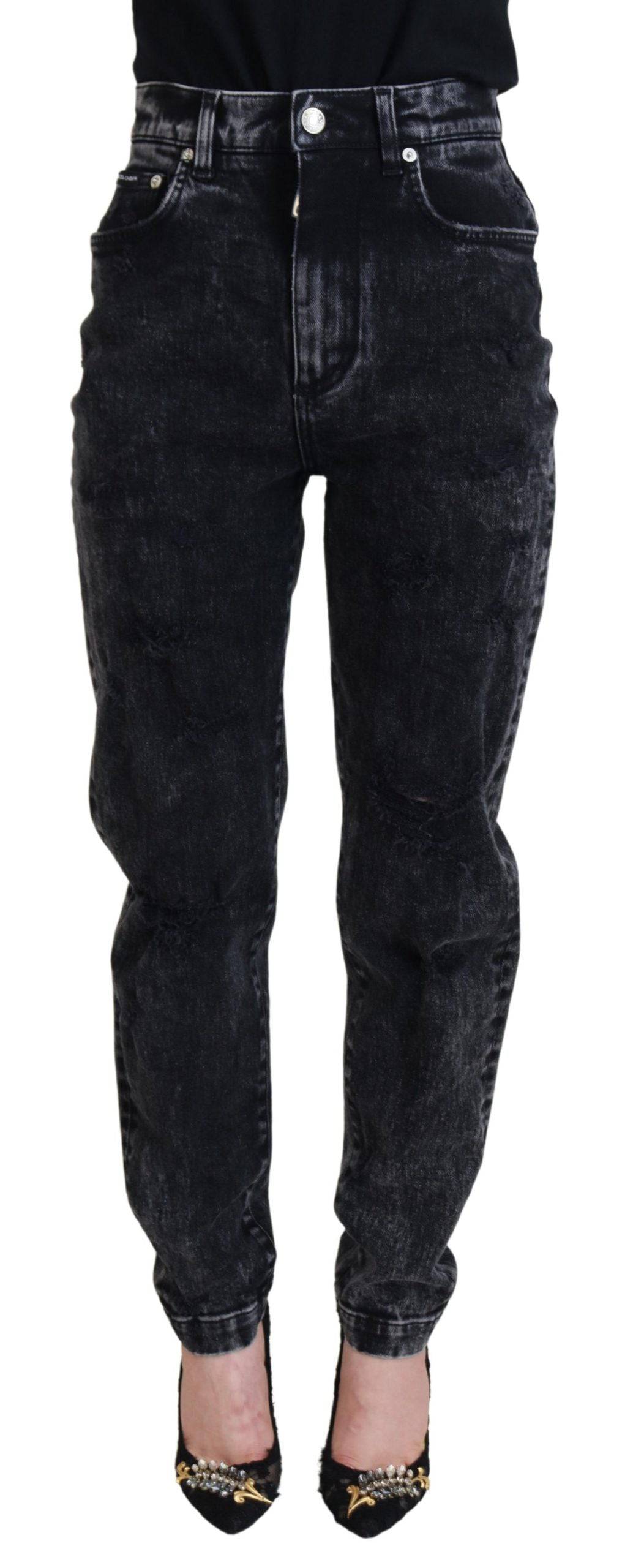 Jean en denim noir Dolce & Gabbana, coupe taille haute en coton lavé, visible avec détails de couture et poches à l’arrière.
