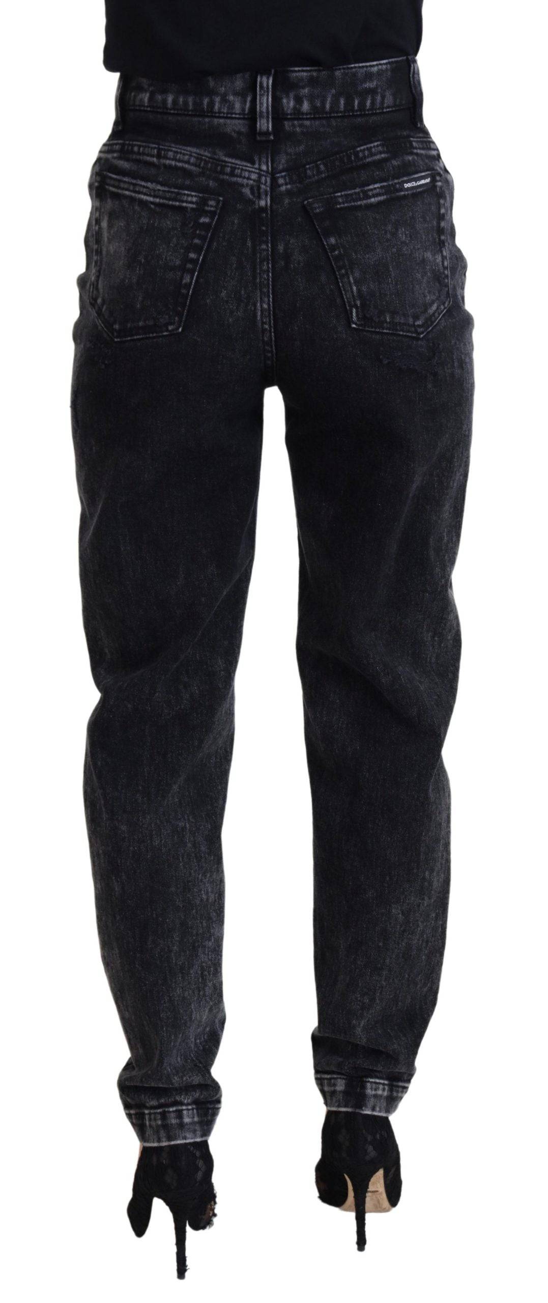 Jeans en denim noir Dolce & Gabbana, taille haute, en coton délavé, avec détails classiques et coupe ajustée.