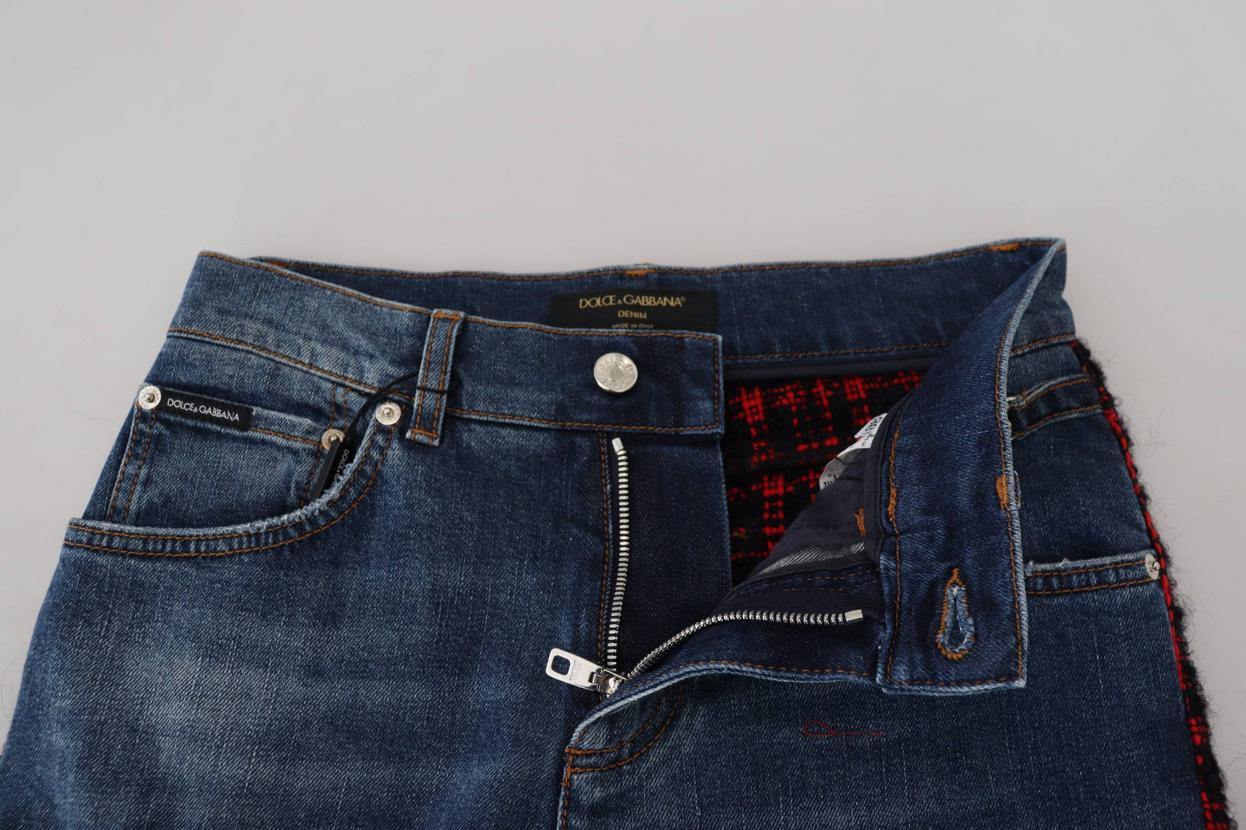 Jeans skinny en denim à carreaux bleus de Dolce & Gabbana, vue arrière présentant la coupe ajustée et le motif à carreaux.