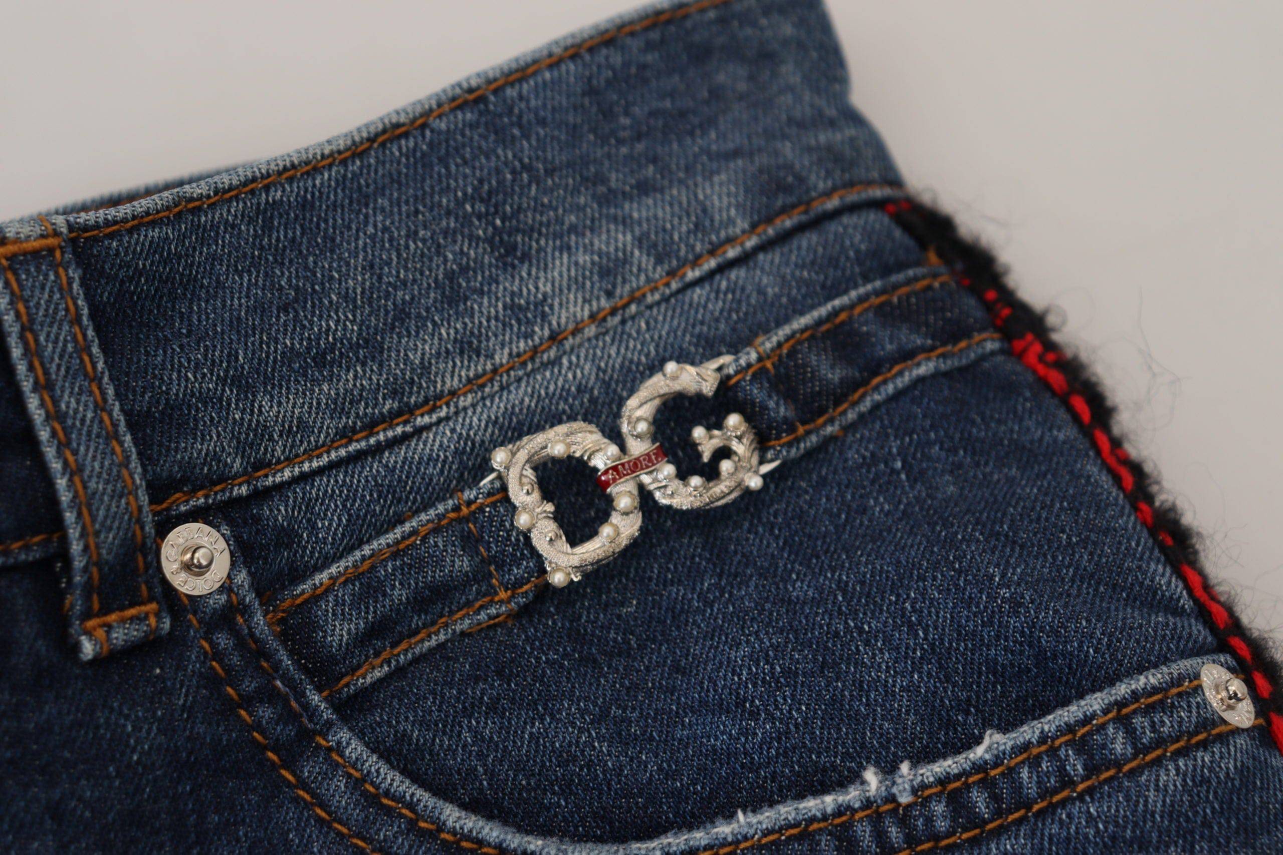 Jeans slim bleu à carreaux Dolce & Gabbana, coupe skinny, en denim avec détails à la ceinture et poches arrière.