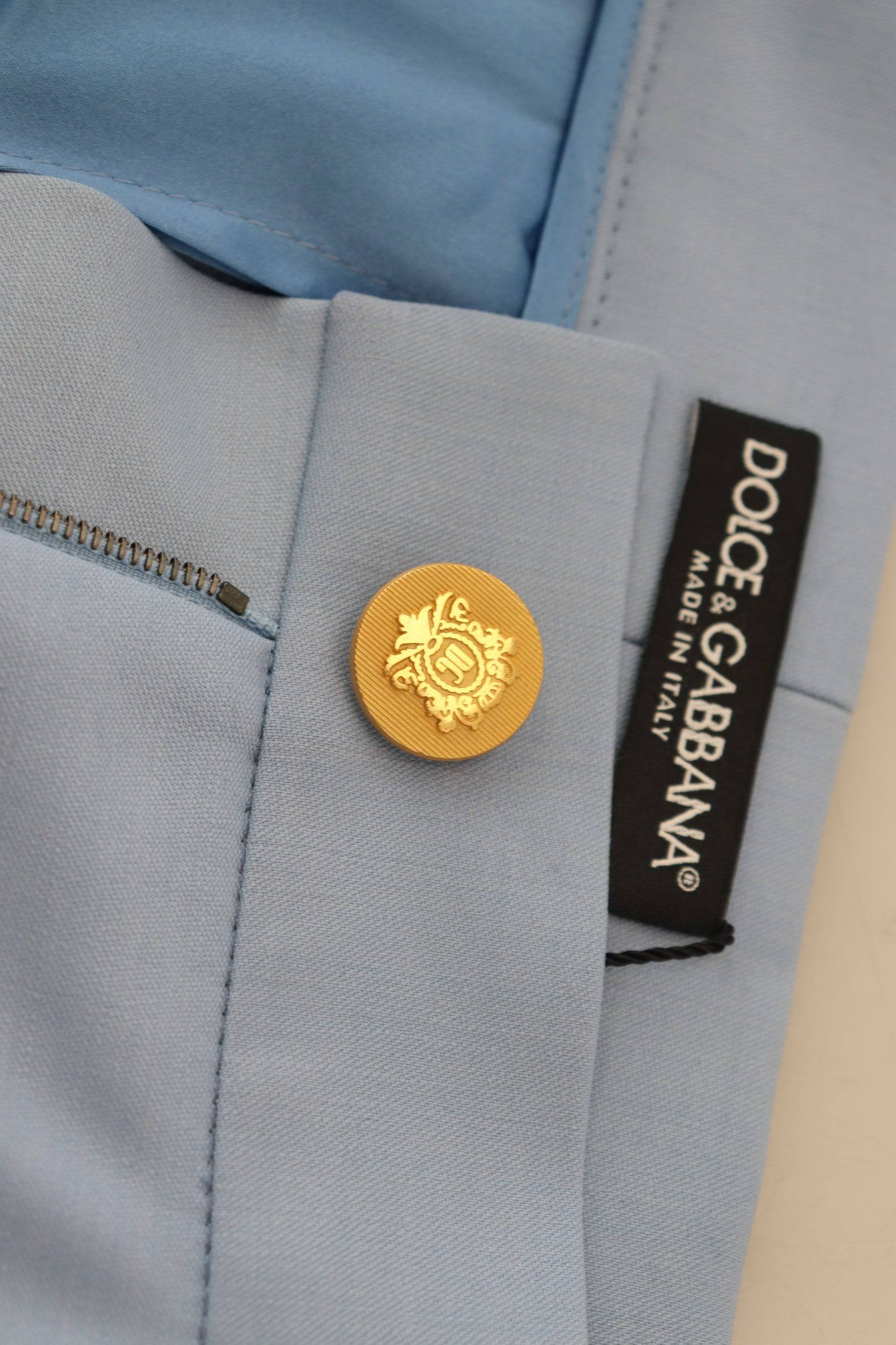 Pantalons droits Dolce & Gabbana Light Blue avec boutons, coupe large, en tissu léger et élégant pour femmes.