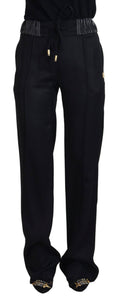Pantalon en coton noir Dolce & Gabbana, coupe droite, style élégant et confortable, visible sur l'image.