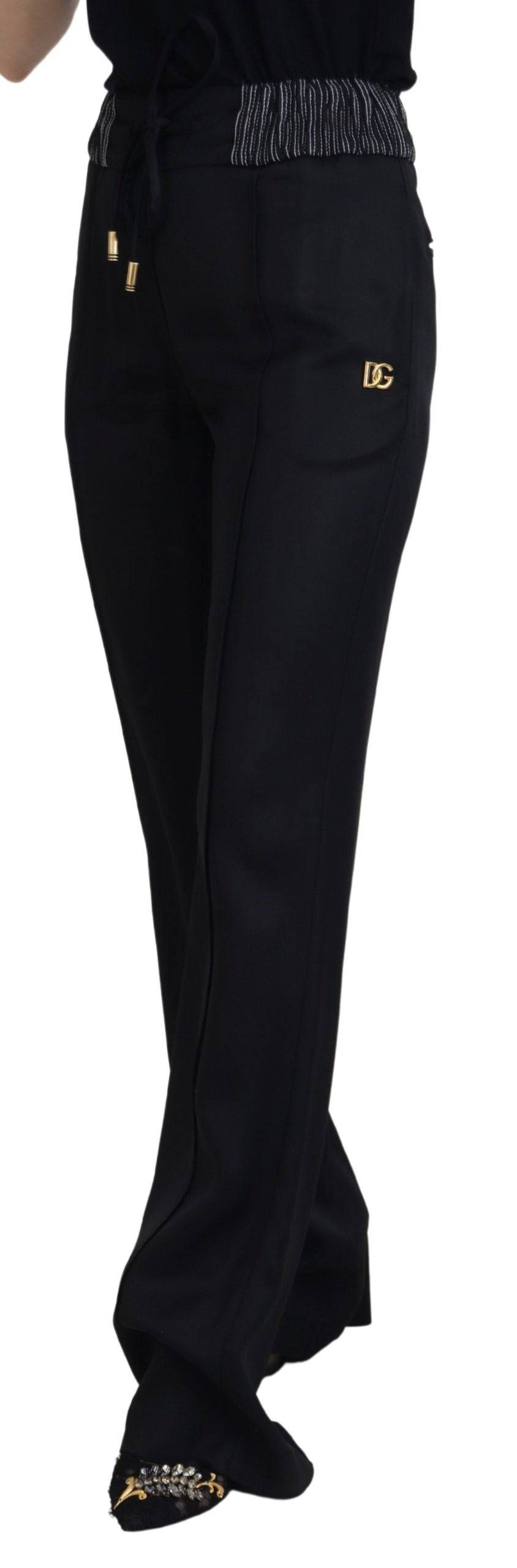 Pantalon noir droit en coton de Dolce & Gabbana, style classique et élégant, visible avec détails de couture et ceinture.