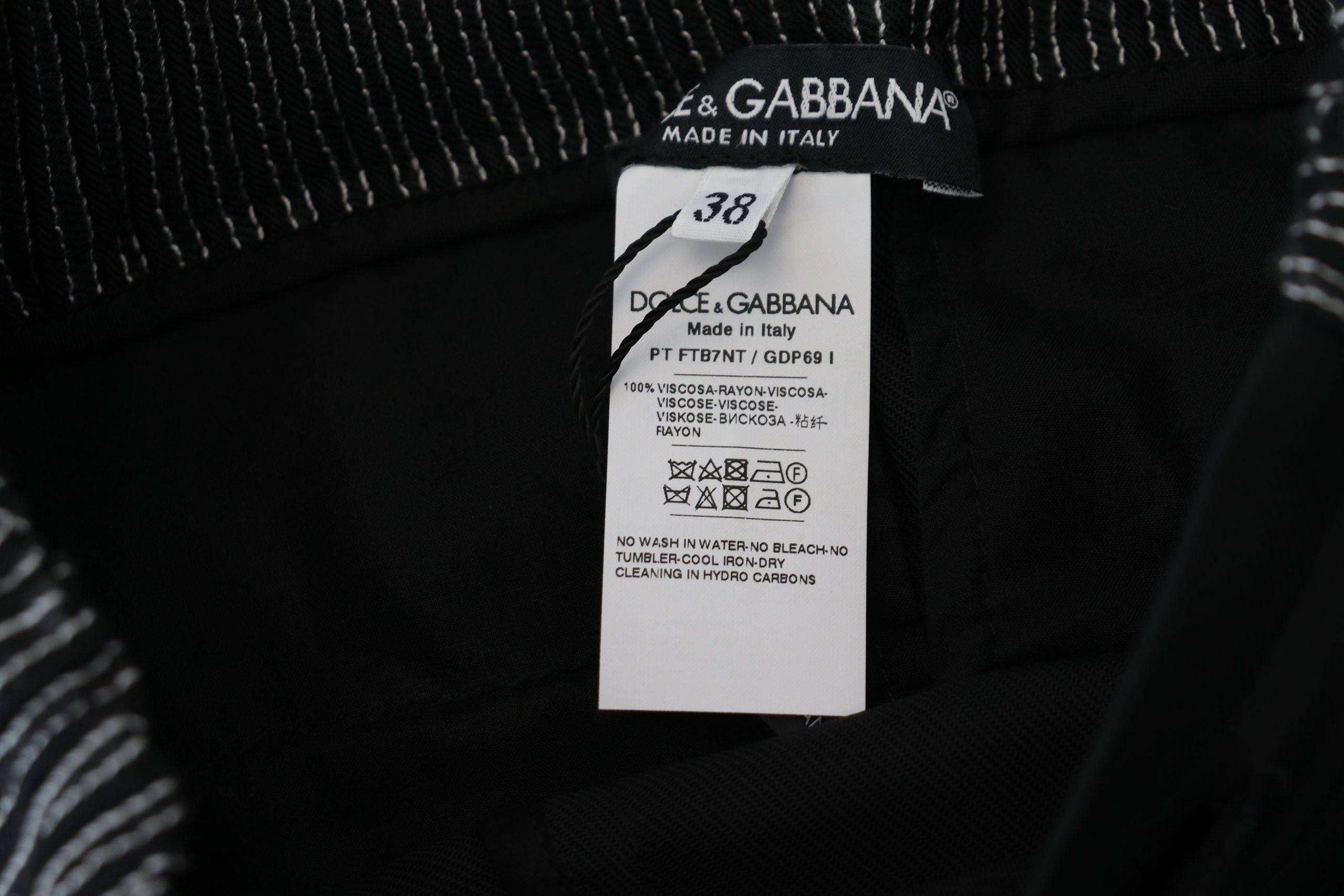 Pantalons droits en coton noir de Dolce & Gabbana, style classique et élégance pour homme.