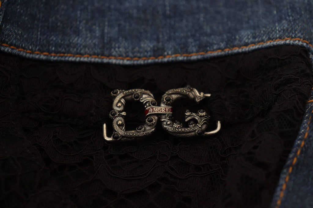 Jeans skinny en denim noir Dolce & Gabbana avec dentelle florale à l'avant, coupe ajustée et détails élégants.