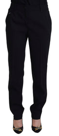Pantalon en laine noir pour femme Dolce & Gabbana, coupe tapered, détail élégant et moderne, porté sur un mannequin.