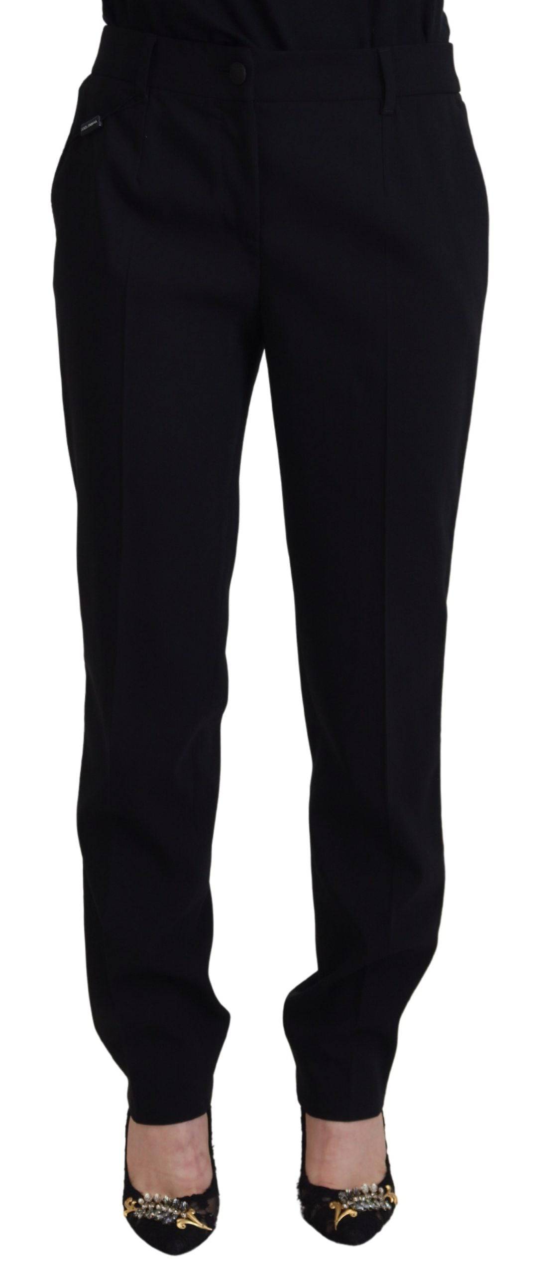 Pantalon en laine noir pour femme Dolce & Gabbana, coupe tapered, détail élégant et moderne, porté sur un mannequin.