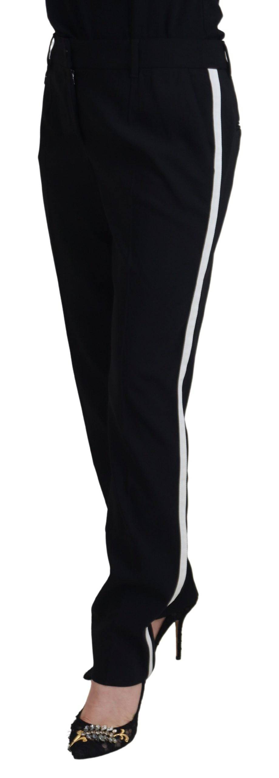 Pantalon en laine noir pour femme de coupe tapered par Dolce & Gabbana, visible avec une coupe élégante et moderne.
