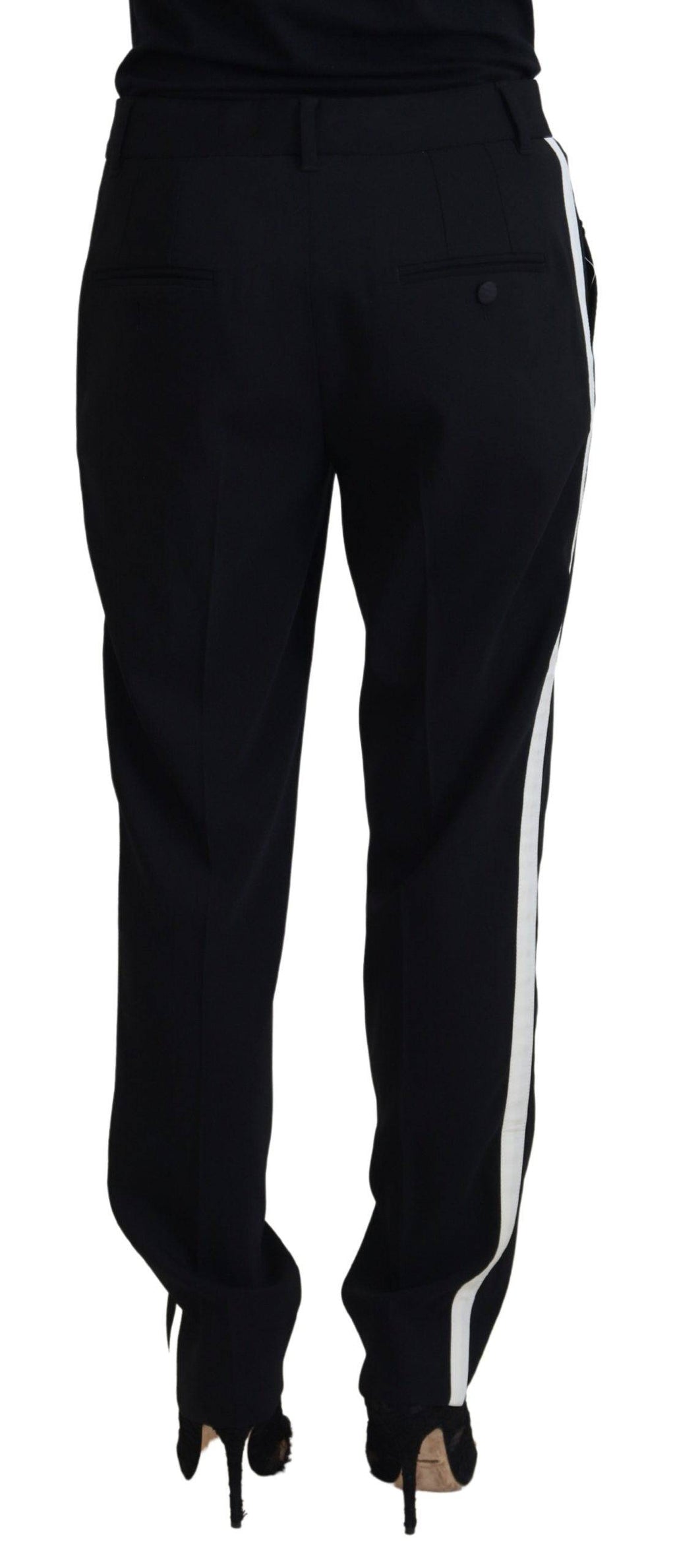 Pantalon en laine noire pour femmes de coupe tapered, de la marque Dolce & Gabbana, visible en détail dans l'image.