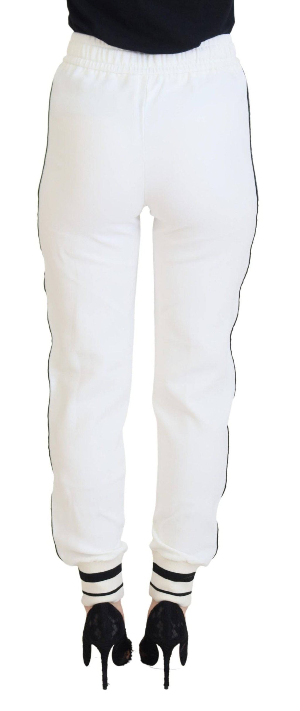 Pantalons de survêtement blancs Dolce & Gabbana avec logo DG, tissu confortable et style décontracté.