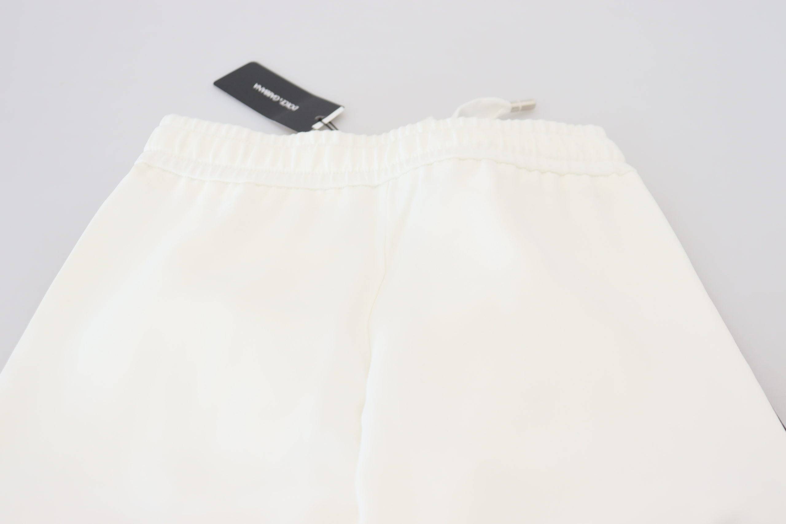 Pantalon de jogging blanc Dolce & Gabbana avec logo DG, mode décontractée, vue de face.