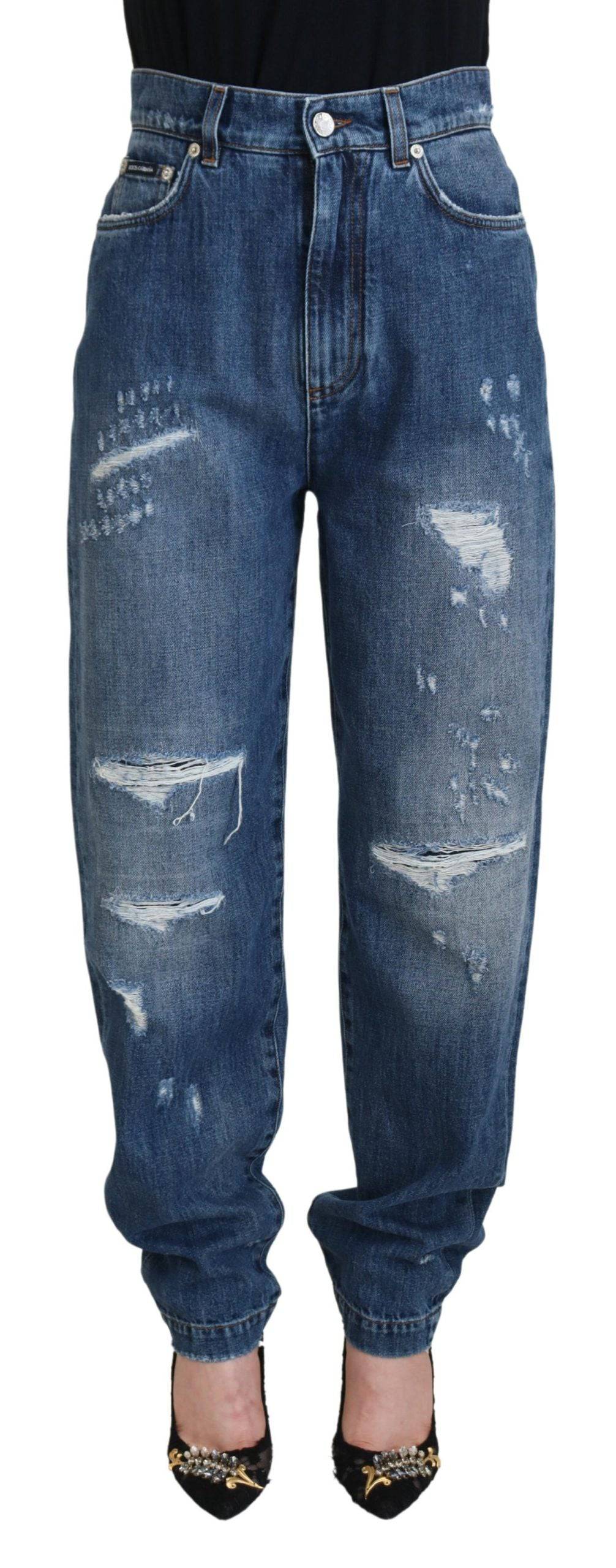 Jeans en denim déchiré en coton lavé bleu de Dolce & Gabbana, style décontracté et tendance avec finition usée.