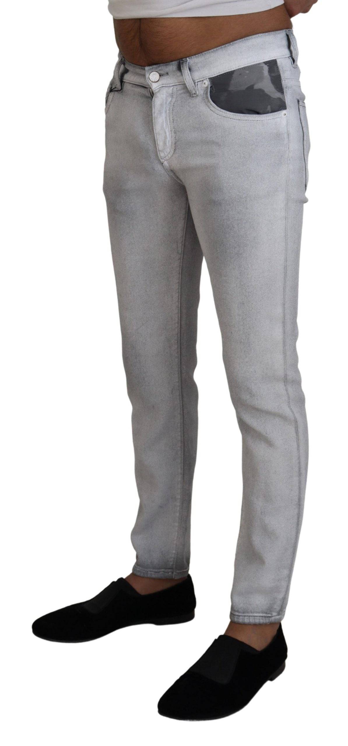 Jeans skinny gris délavé pour homme de Dolce & Gabbana, en denim, avec coupe ajustée et détails modernes.