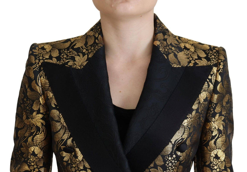 Blazer Dolce & Gabbana en jacquard noir et or, veste élégante avec motif sophistiqué, portée comme un manteau ou blazer.