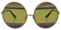 Lunettes de soleil Dolce & Gabbana DG2209B avec monture ovale en métal doré et cristaux, style élégant et sophistiqué.