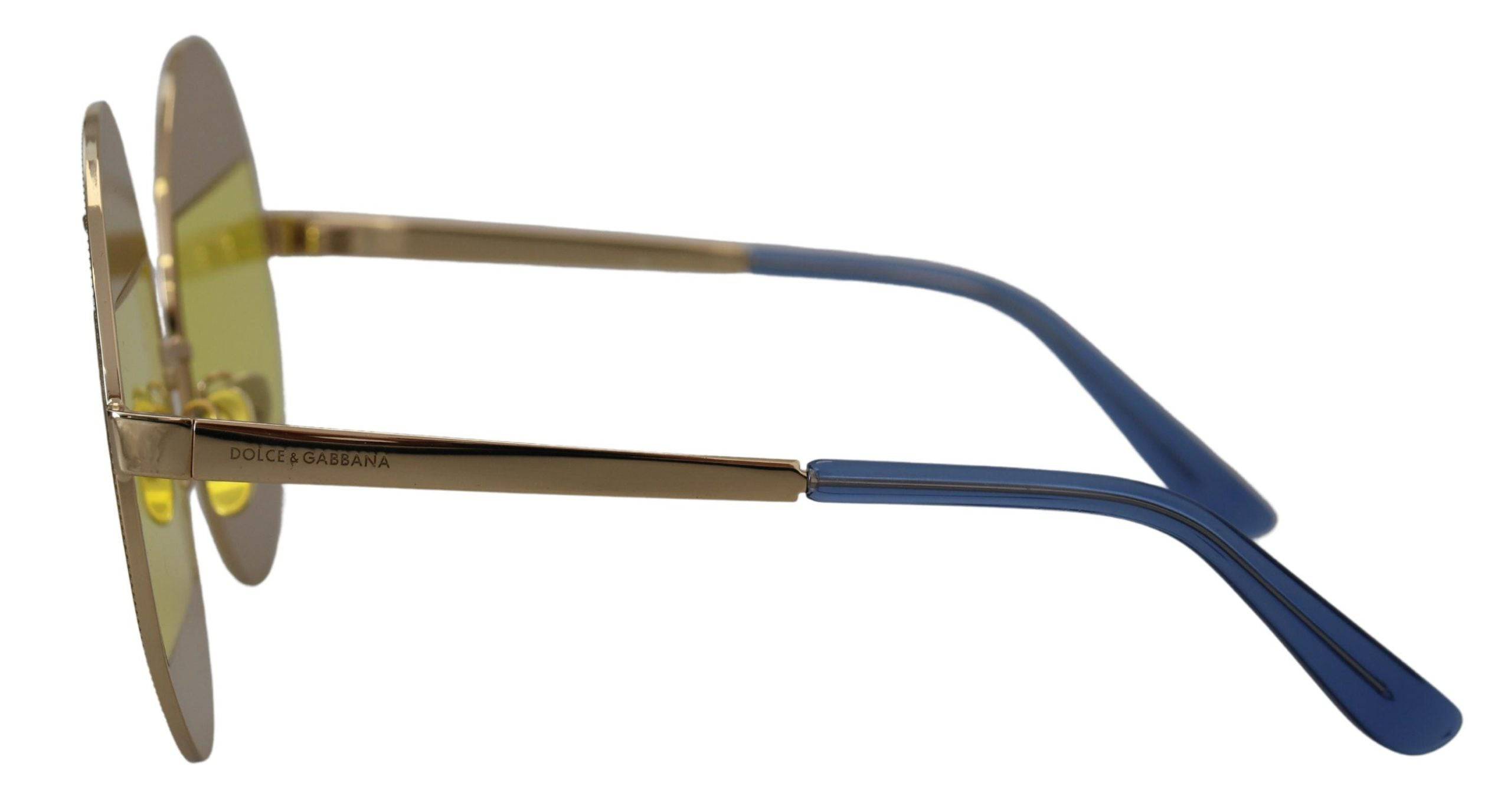 Lunettes de soleil ovales en métal doré avec cristaux de la marque Dolce & Gabbana, modèle DG2209B.
