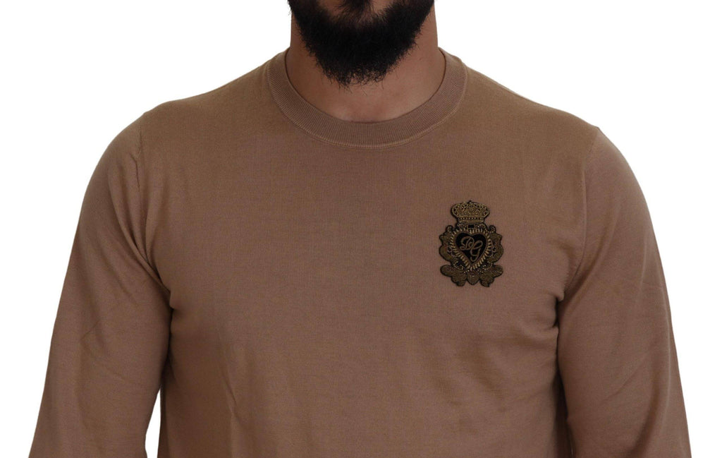 Pull en cachemire beige avec logo couronne Dolce & Gabbana, pull élégant et confortable, vue de face.