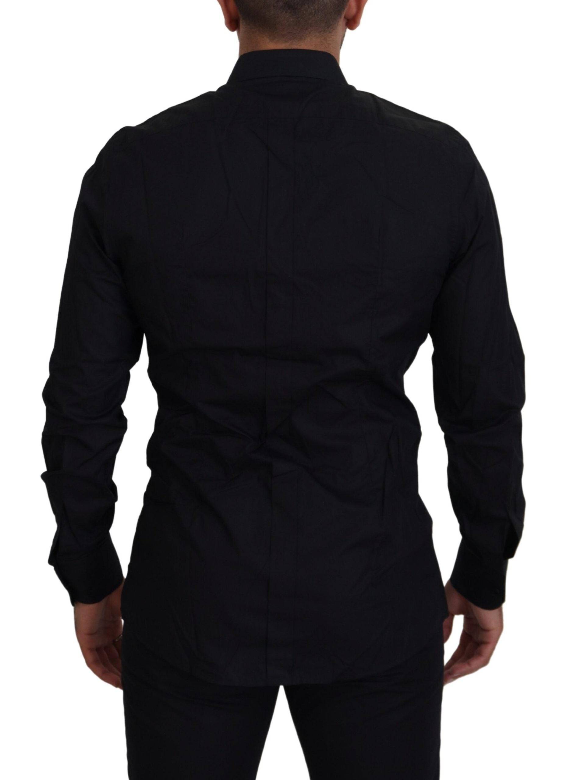 Chemise formelle Dolce & Gabbana noire avec détails dorés, coupe slim fit et motif couronne élégante.