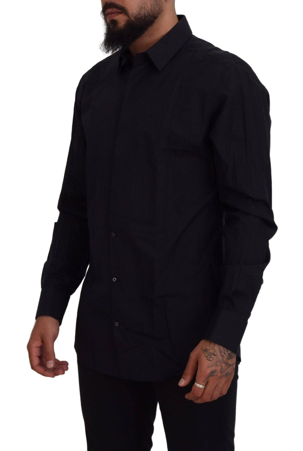 Chemise homme Dolce & Gabbana en coton noir avec détails dorés, coupe slim fit élégante, idéale pour une tenue sophistiquée.