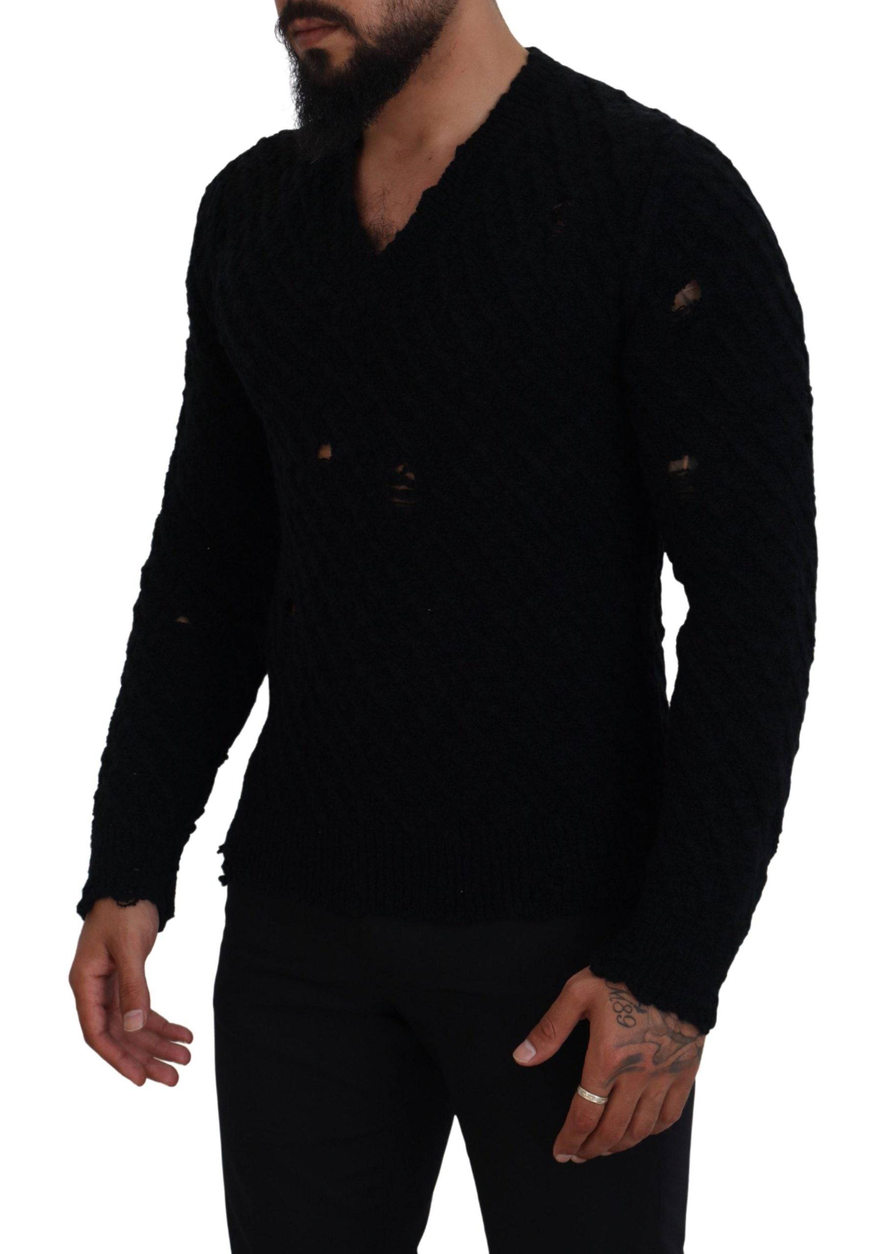 Pull en laine noir Dolce & Gabbana, pull-over à col en V, tricoté, élégant et chaud, visible sur l'image.