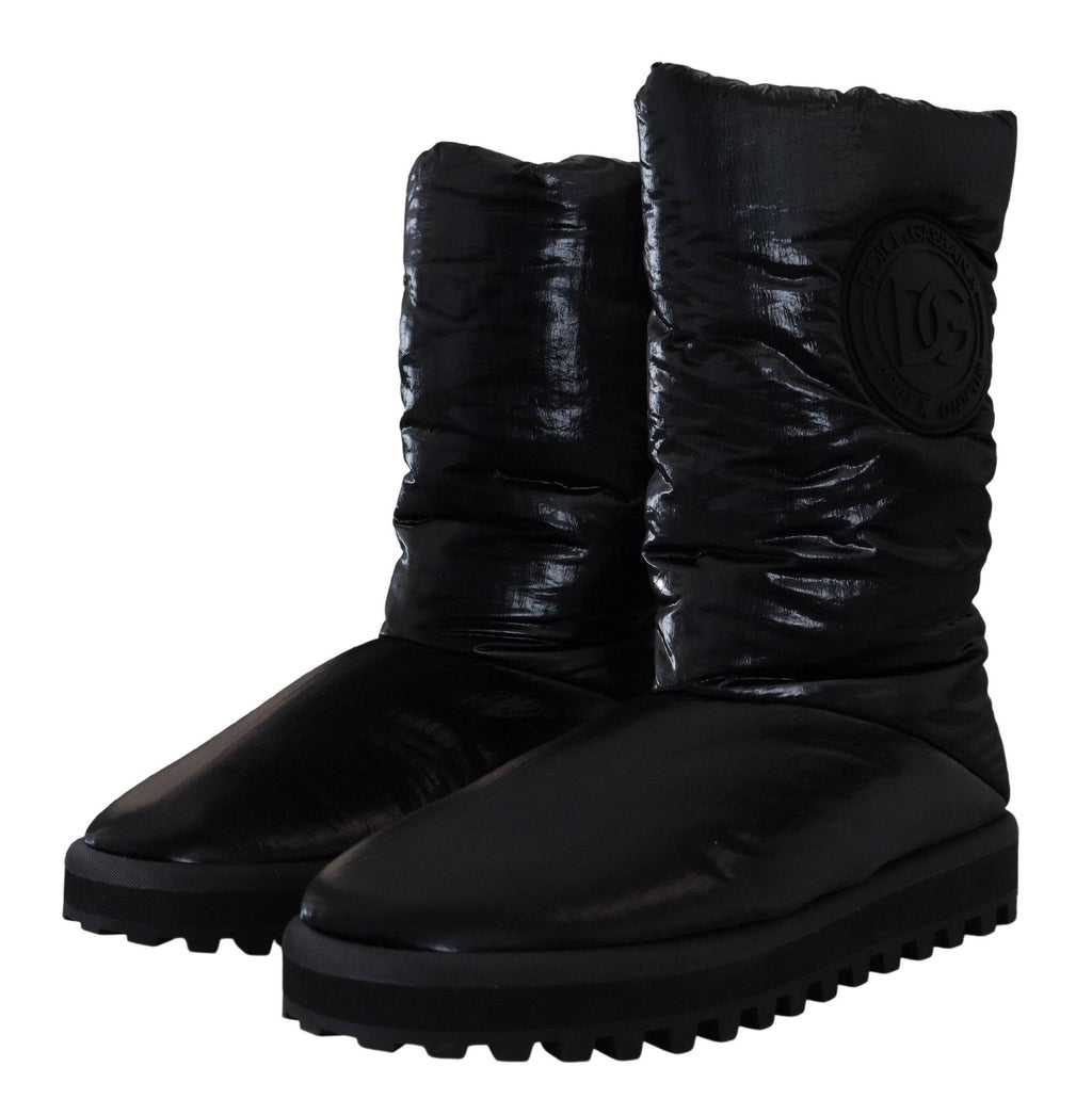 Bottes noires Dolce & Gabbana rembourrées, mi-mollet, chaussures d'hiver élégantes avec semelle robuste.