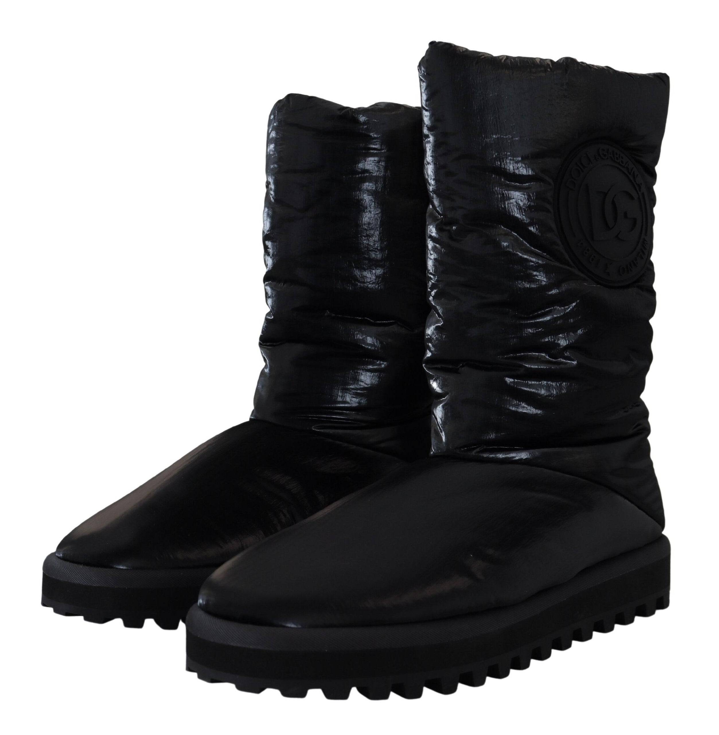 Bottes noires Dolce & Gabbana rembourrées, mi-mollet, chaussures d'hiver élégantes avec semelle robuste.