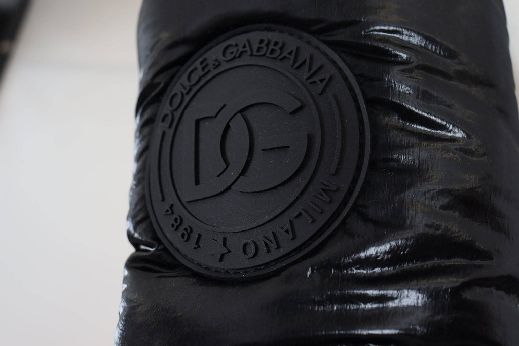Bottes noires Dolce & Gabbana, chaudes et rembourrées, jusqu’au mollet, parfaites pour l’hiver.