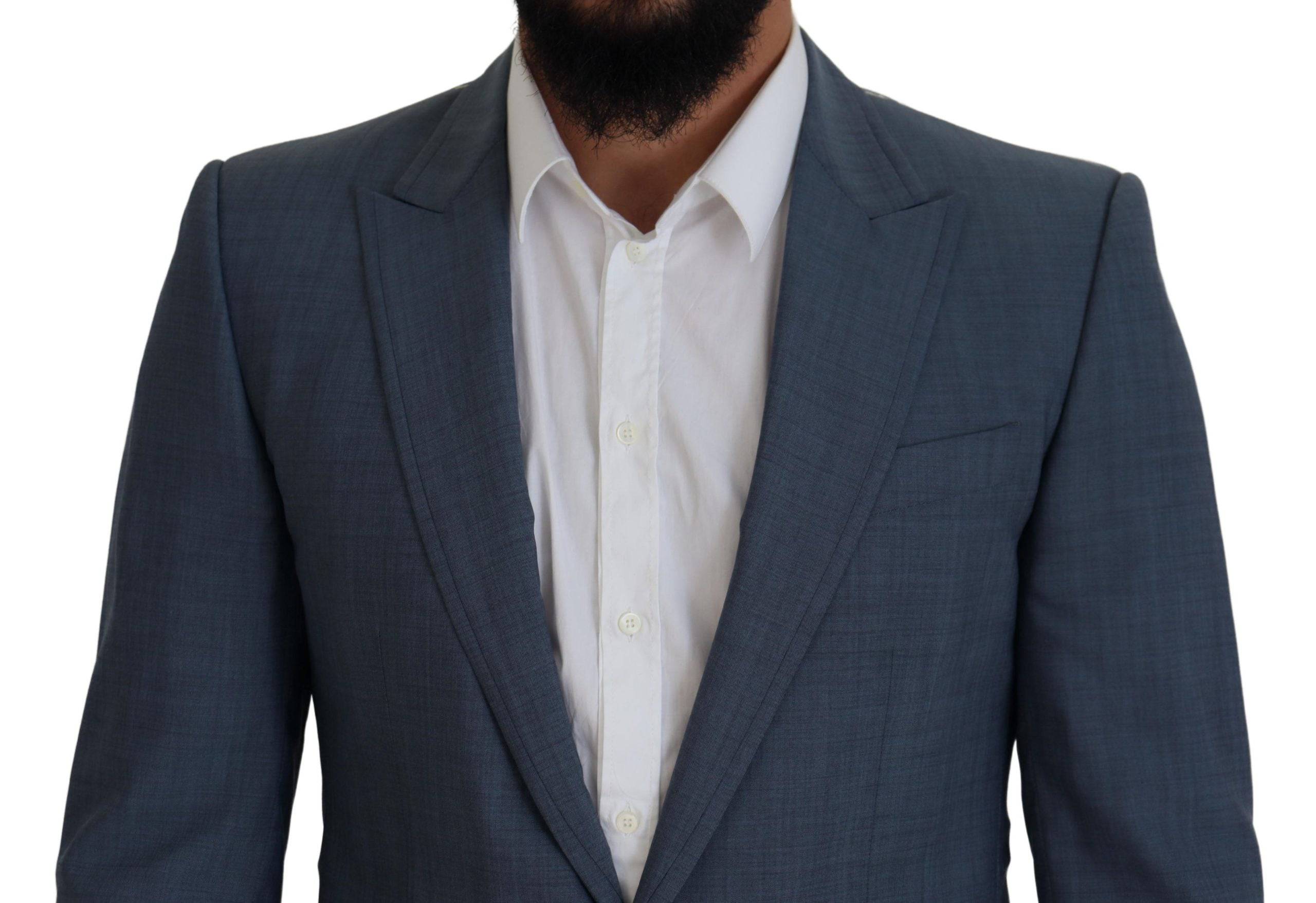 Veste blazer en laine bleue stretch Dolce & Gabbana, coupe slim fit, élégante et moderne, adaptée pour un look chic.