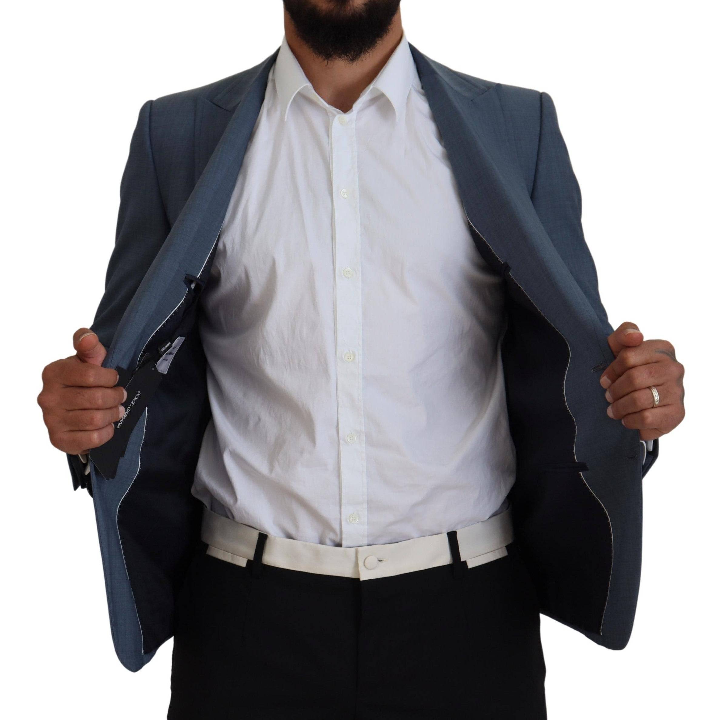Veste blazer en laine bleue Dolce & Gabbana, coupe slim fit, élégante et ajustée pour homme.
