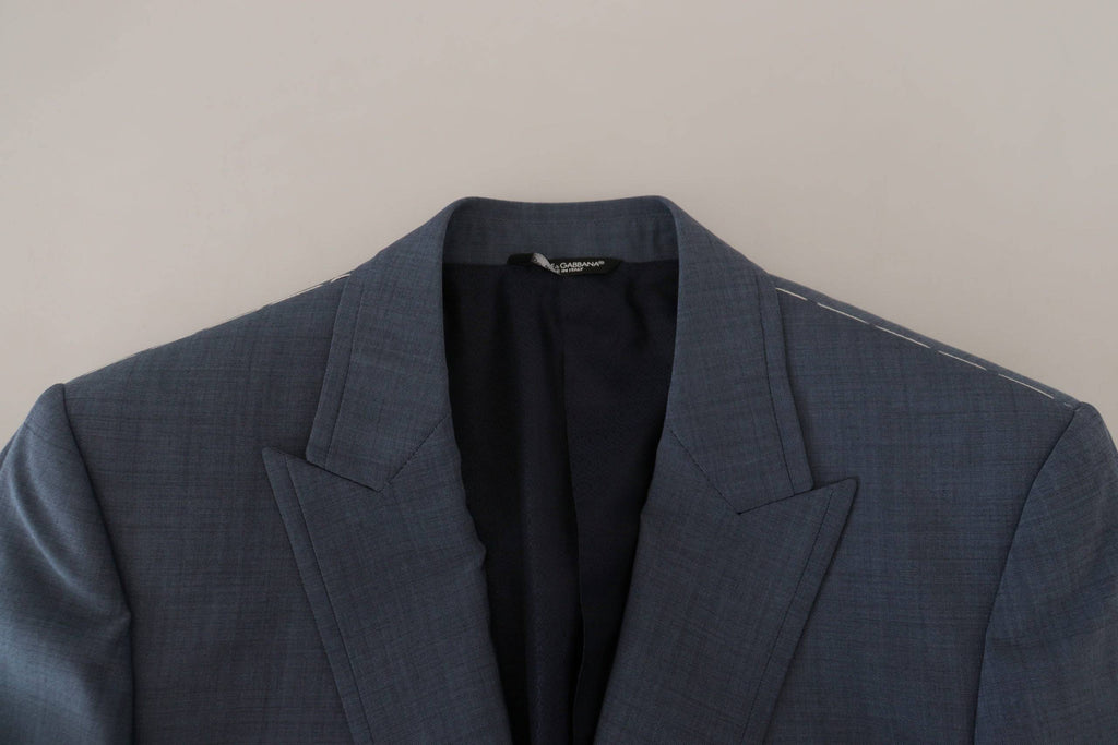 Veste blazer slim fit en laine bleue Dolce & Gabbana, coupe ajustée et élégante, vue de face sur un fond neutre.