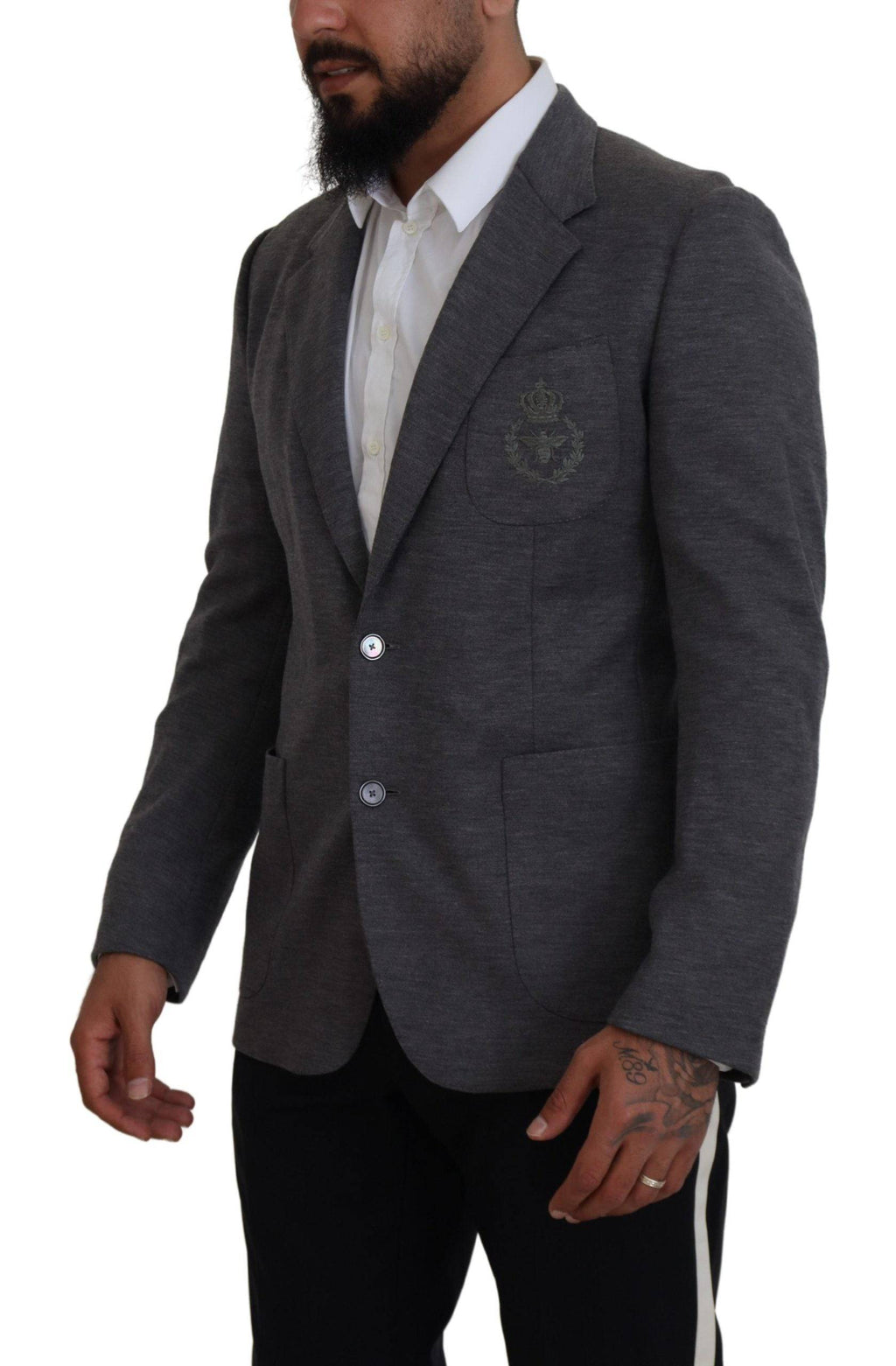 Veste blazer en laine grise Dolce & Gabbana, coupe slim ajustée, élégante et sophistiquée, vue de face.