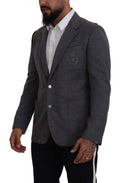 Veste blazer en laine grise Dolce & Gabbana, coupe slim ajustée, élégante et sophistiquée, vue de face.