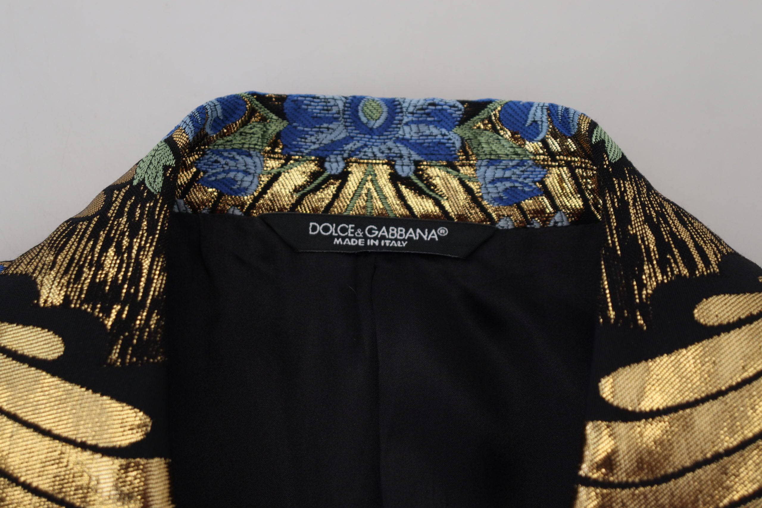 Veste blazer en lurex doré Dolce & Gabbana à double boutonnage, élégante et sophistiquée, visible en gros plan.