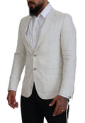 Veste blazer en lin blanc Dolce & Gabbana, coupe slim fit, élégante et légère, avec détails sophistiqués.