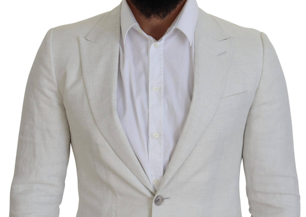 Veste blazer en lin blanc Dolce & Gabbana, coupe slim fit, élégante et légère, adaptée pour un style chic et sophistiqué.