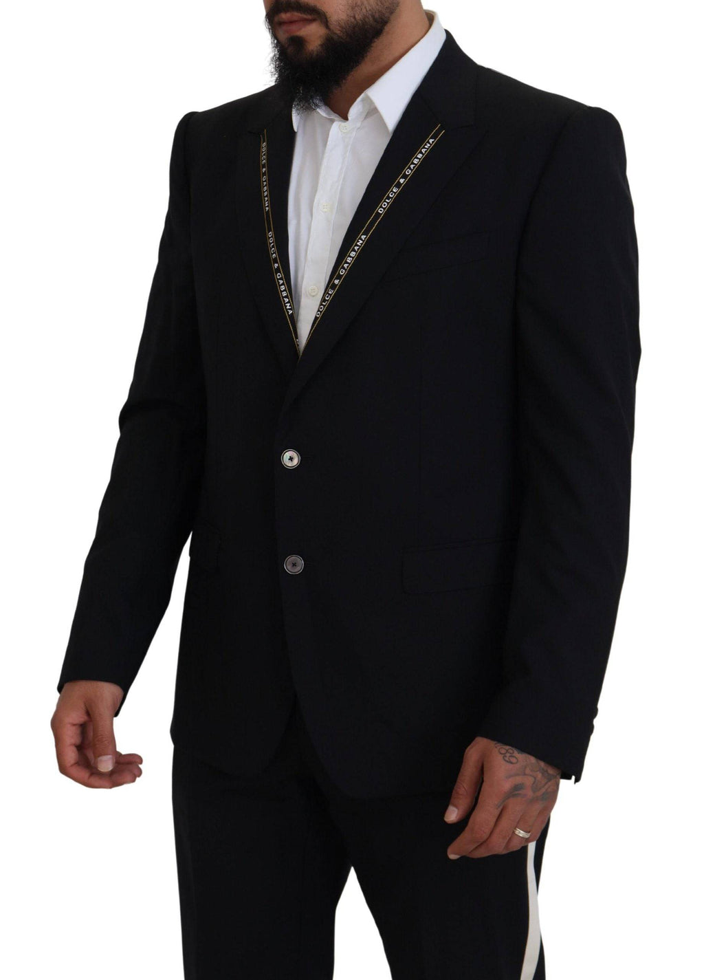Veste blazer Dolce & Gabbana en laine noire, ajustée et slim fit, visible avec col et boutons élégants.