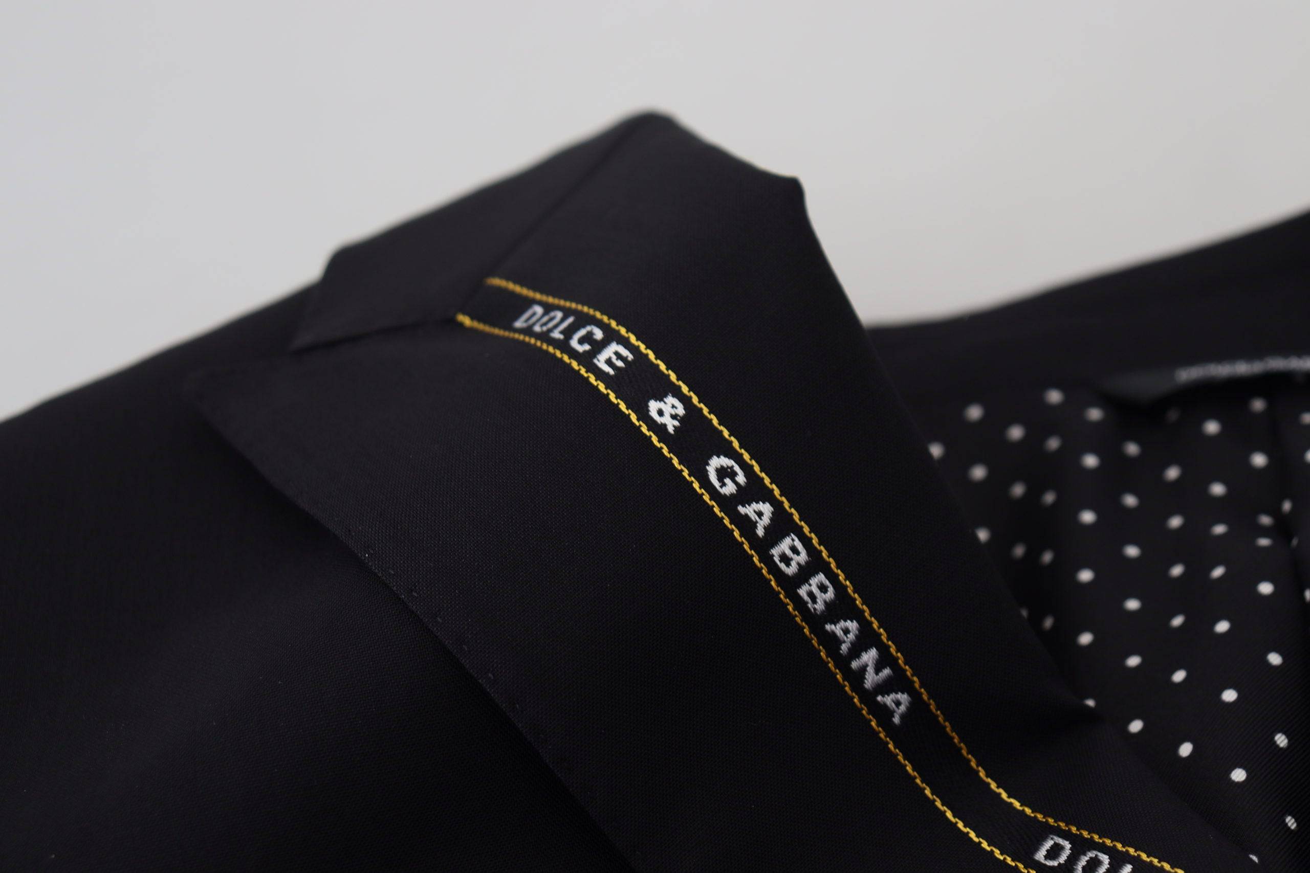 Veste blazer noire en laine stretch Dolce & Gabbana, coupe slim fit, élégante et sophistiquée pour homme.