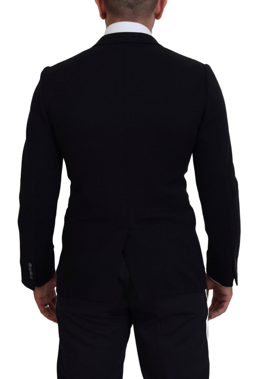 Veste blazer slim fit en laine noire de Dolce & Gabbana, avec une coupe élégante et une couronne comme détail de design.