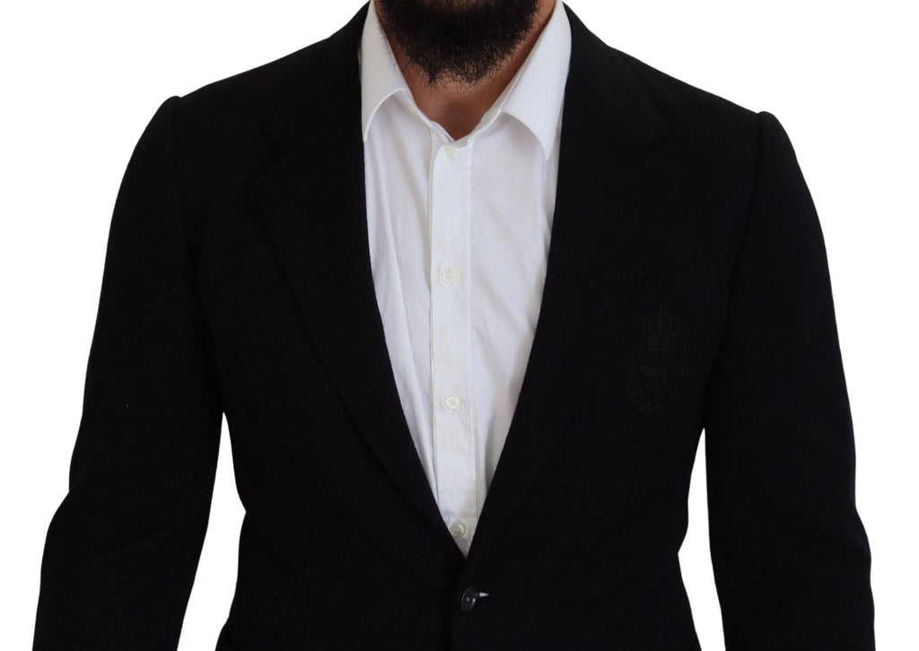 Veste blazer noire en laine Dolce & Gabbana, coupe slim fit, avec col en forme de couronne, pour un style élégant et sophistiqué.