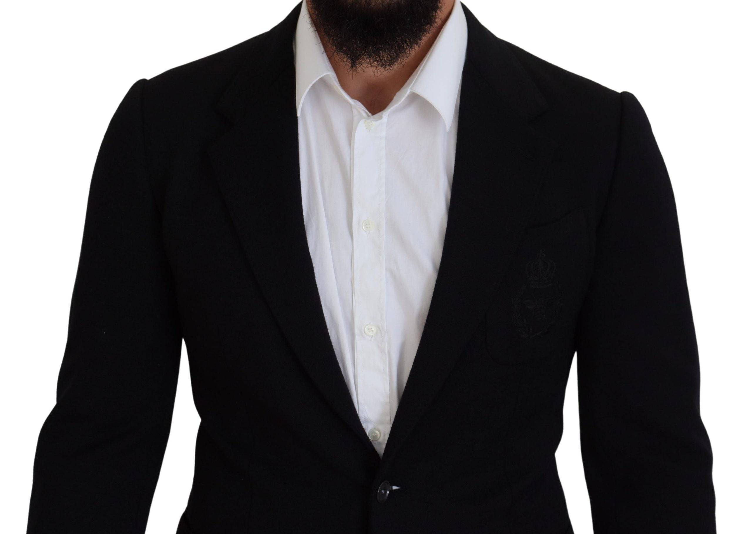 Veste blazer noire en laine Dolce & Gabbana, coupe slim fit, avec col en forme de couronne, pour un style élégant et sophistiqué.