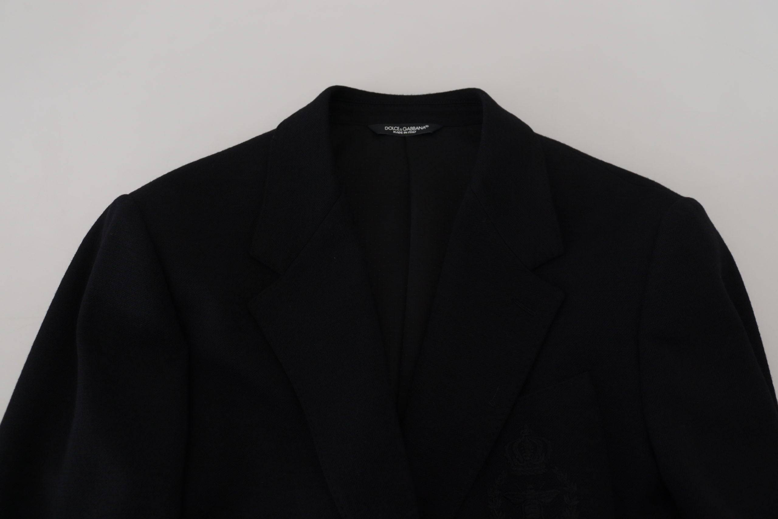 Veste blazer noire en laine Dolce & Gabbana, coupe slim, avec col en forme de couronne, élégante et moderne.