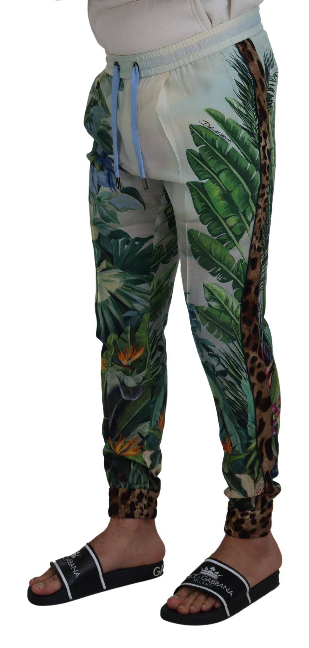 Pantalons jogger pour homme Dolce & Gabbana blancs avec imprimé floral, style décontracté et confortable.