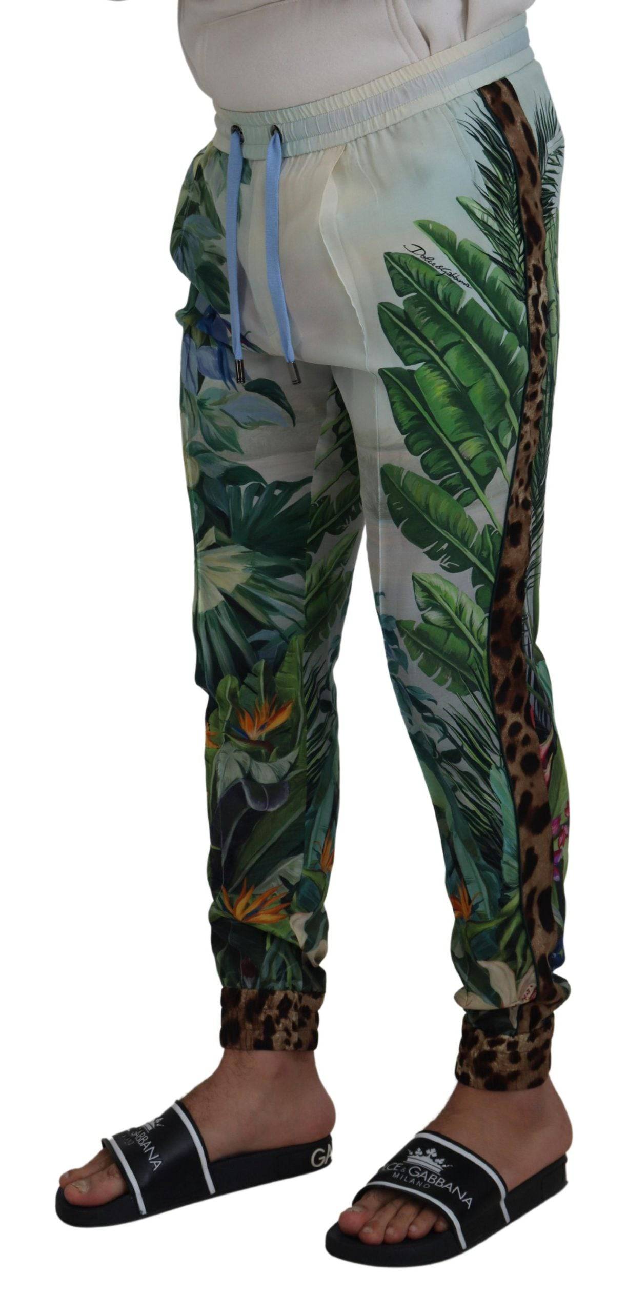 Pantalons jogger pour homme Dolce & Gabbana blancs avec imprimé floral, style décontracté et confortable.