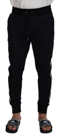 Pantalon jogger pour homme Dolce & Gabbana noir avec motif DG, matière confortable et style décontracté.