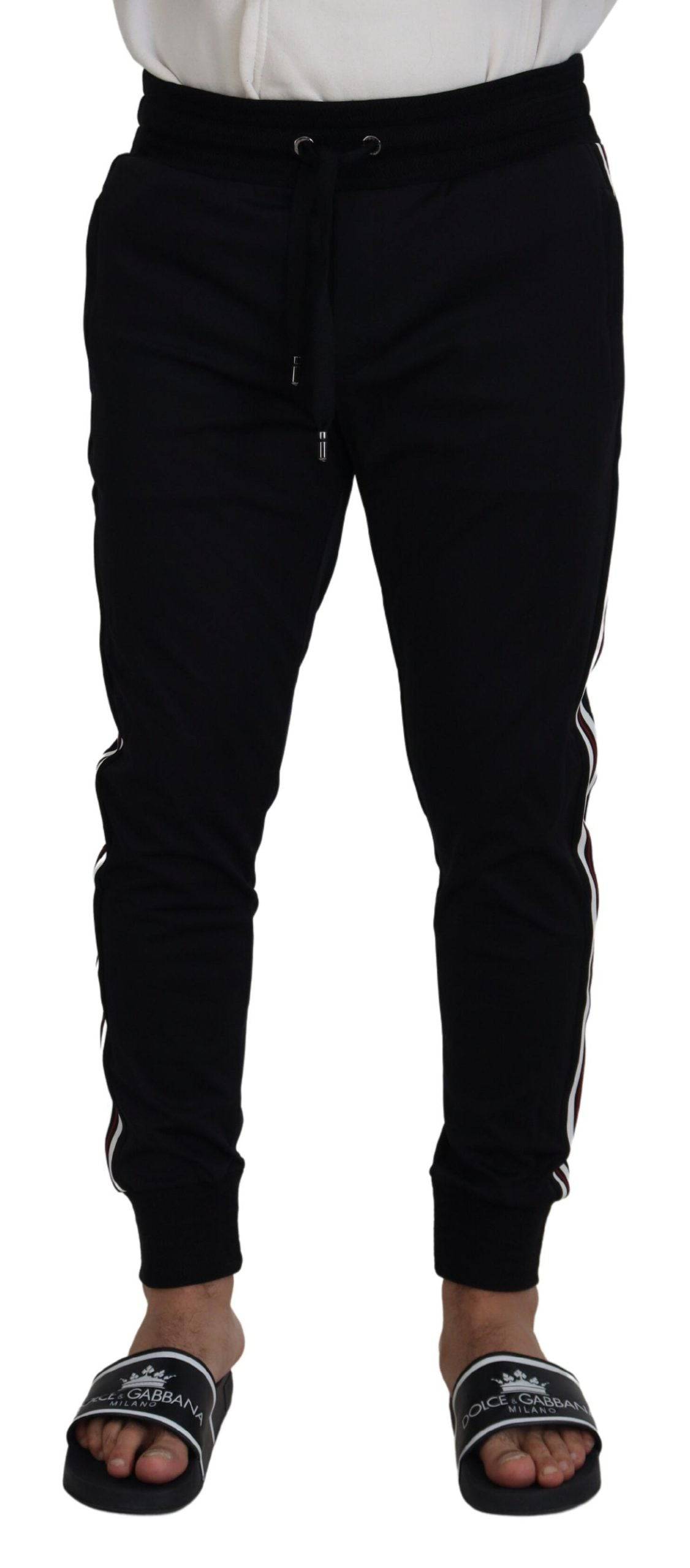 Pantalon jogger pour homme Dolce & Gabbana noir avec motif DG, matière confortable et style décontracté.